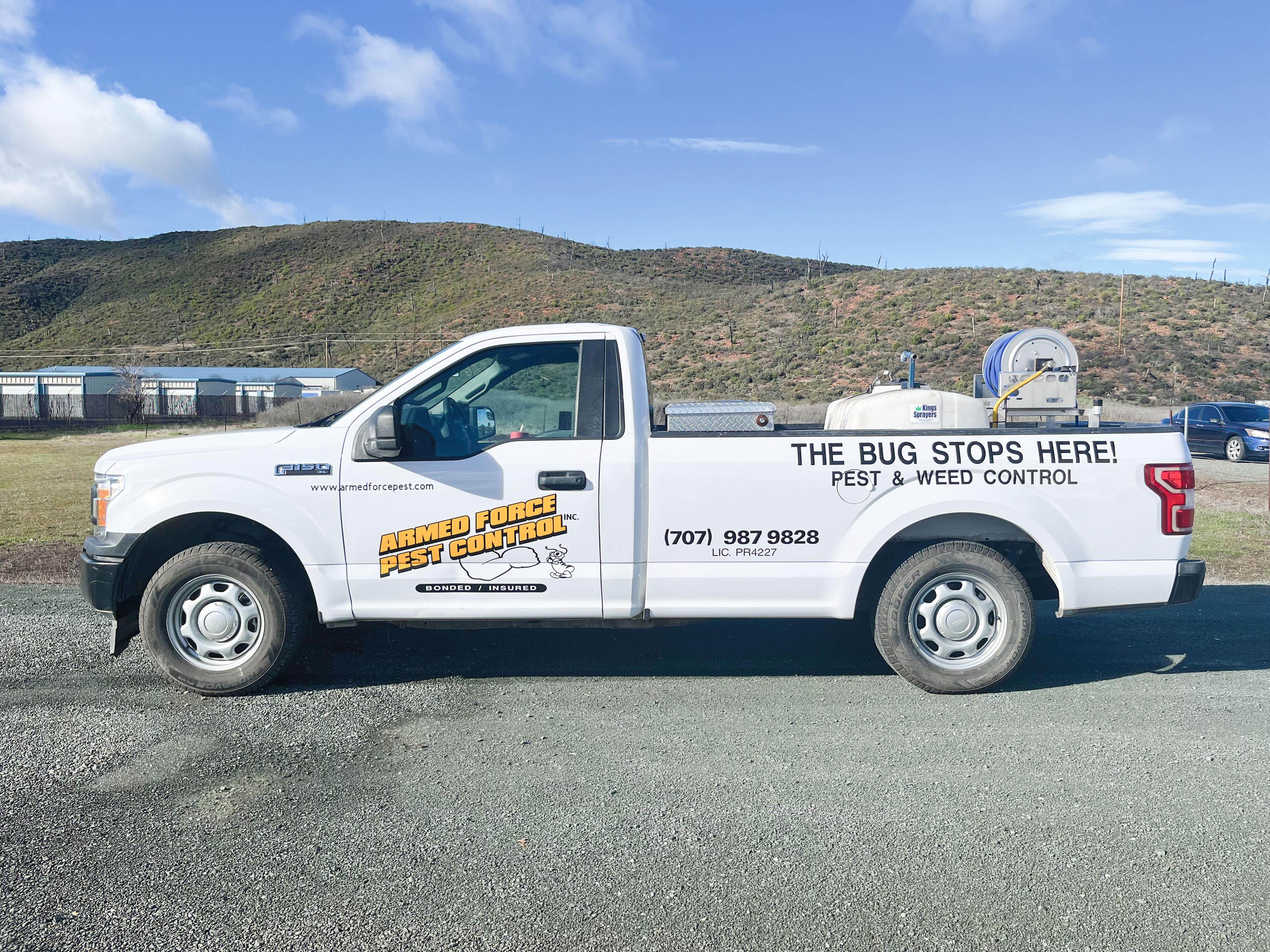 Picture of One of Armed Force Pest Control's service trucks on a recent jobsite - Armed Force Pest Control, Inc.