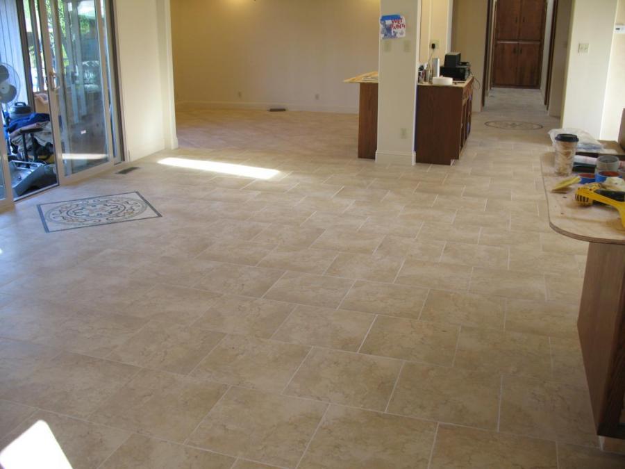 Picture of DC Tile and Stone installed this 12x24 brick lay pattern tile with a mosaic accent. - DC Tile and Stone