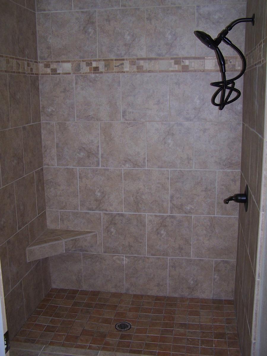 Picture of Porcelain tile shower with marble feature strip. - Labourdette Construction