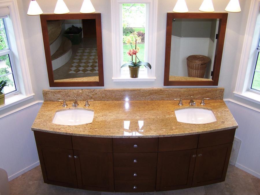 Picture of Curved alder wood vanity cabinet with matching medicine chests. - Labourdette Construction
