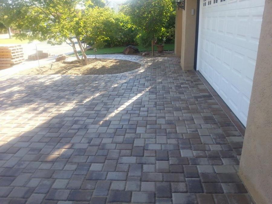 Picture of This Calstone cobblestone installation features cream tan and brown colors. - Atlas Pavers Co.