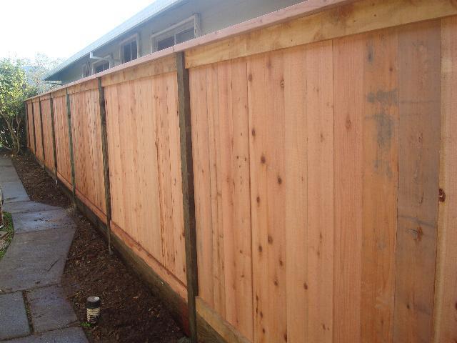 Picture of This double-sided fence provides both neighbors with the same look on each side. - Redwood Residential Fence Company