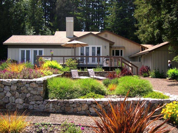 Picture of Gardens of the Wine Country installed these stone walls to create new elevations. - Gardens of the Wine Country Inc.
