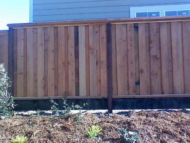 Picture of Board-on-board fences combine beauty practicality and privacy. - Redwood Residential Fence Company