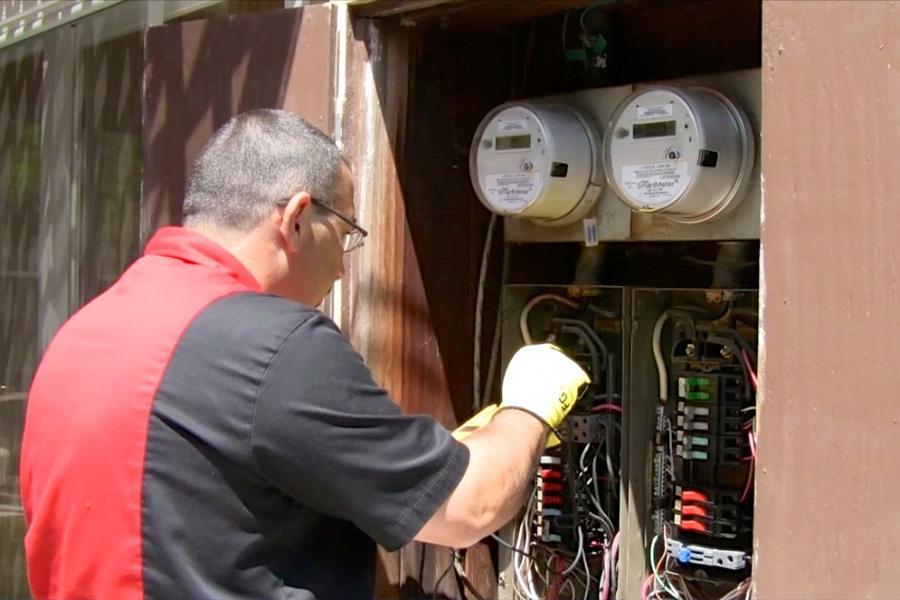 Picture of Mr. Gorginian performs a test on a customer's electrical system. - Mr. Electric of San Mateo