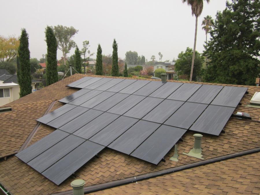 Picture of Black-on-black modules on a composite shingle roof. - Freedom Solar, Inc