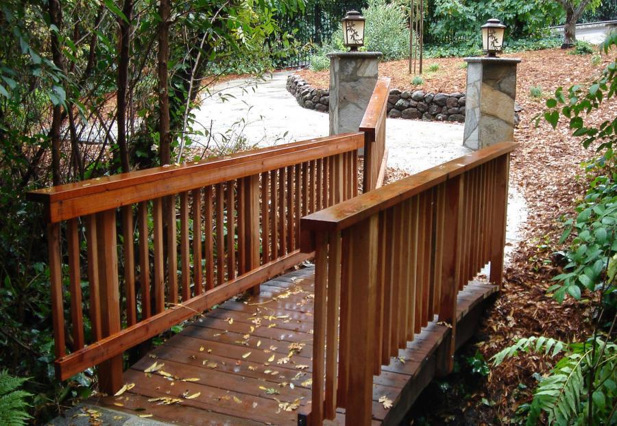 Picture of Pacific Landscaping built this redwood bridge that runs over a small natural stream in Walnut Creek. - Pacific Landscaping