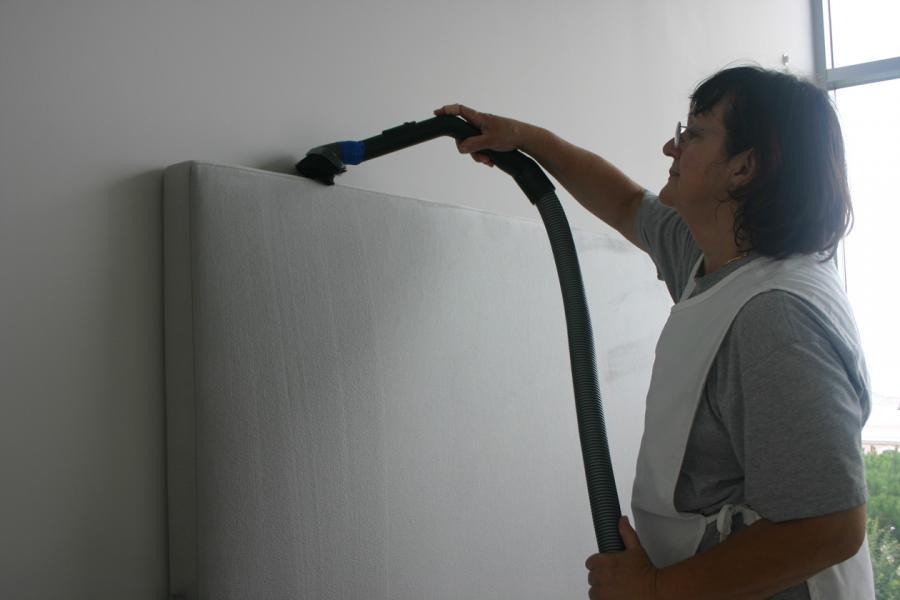 Picture of SonoMarin Cleaning Services uses the proper brushes and vacuuming pressure to remove dust from walls covered with fabrics. - SonoMarin Cleaning Services, Inc.