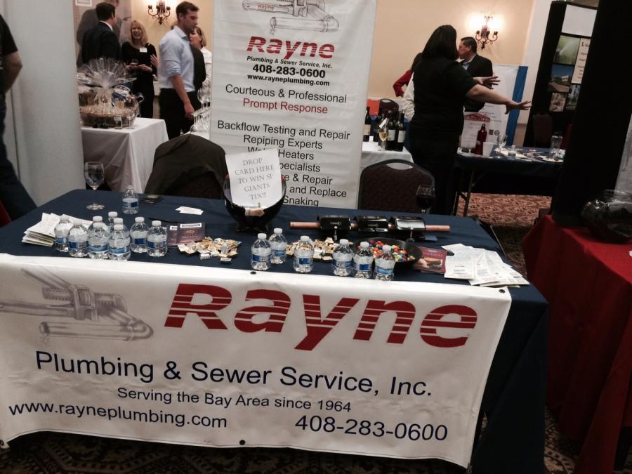 Picture of Rayne Plumbing and Sewer Service's table at a local property management trade show - Rayne Plumbing and Sewer Service, Inc.
