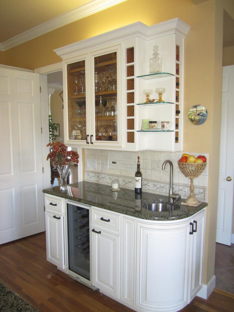 Picture of These curved cabinet doors mirror the curvature of the sink. - Century Cabinets