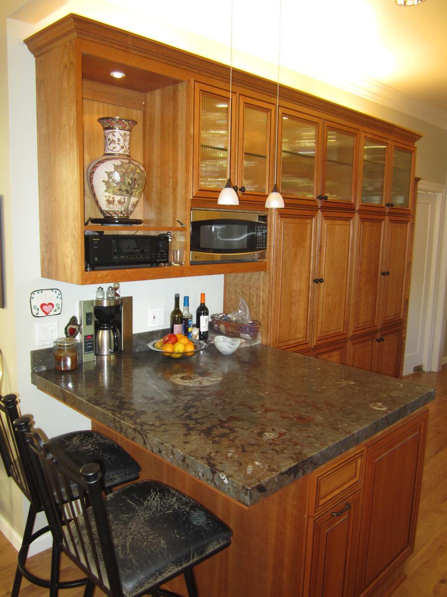 Picture of Lighting and glass doors help show off important pieces. - Century Cabinets