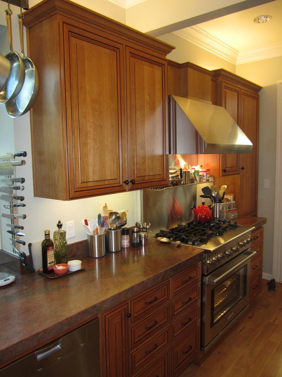 Picture of Full-height cabinets allow extra storage. - Century Cabinets