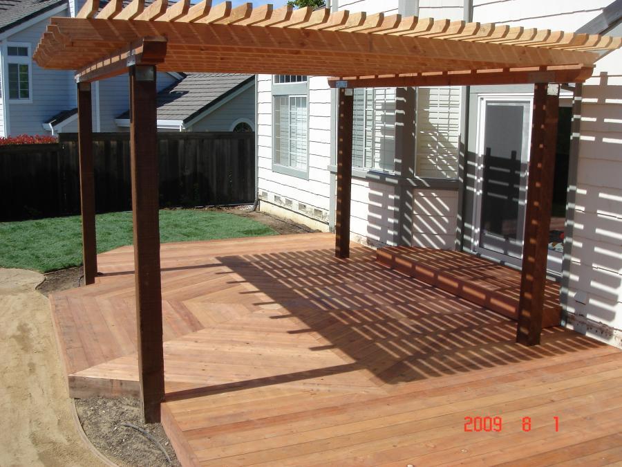 Picture of Pacific Landscaping built this octagon-shaped redwood deck with an arbor in Clayton. - Pacific Landscaping