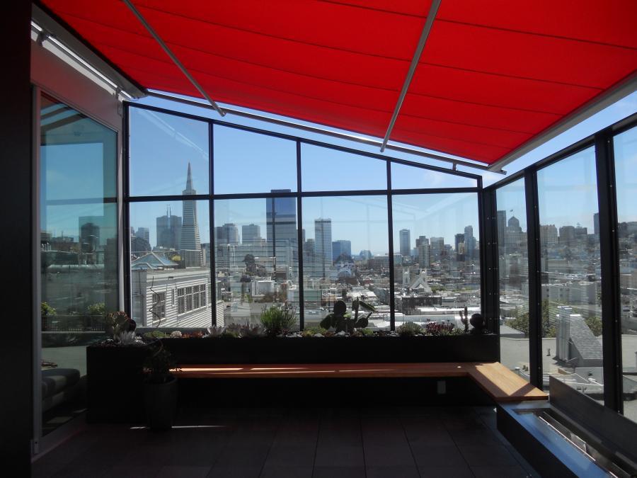 Picture of A motorized retractable conservatory awning on a rooftop in San Francisco - ACME SUNSHADES ENTERPRISE INC
