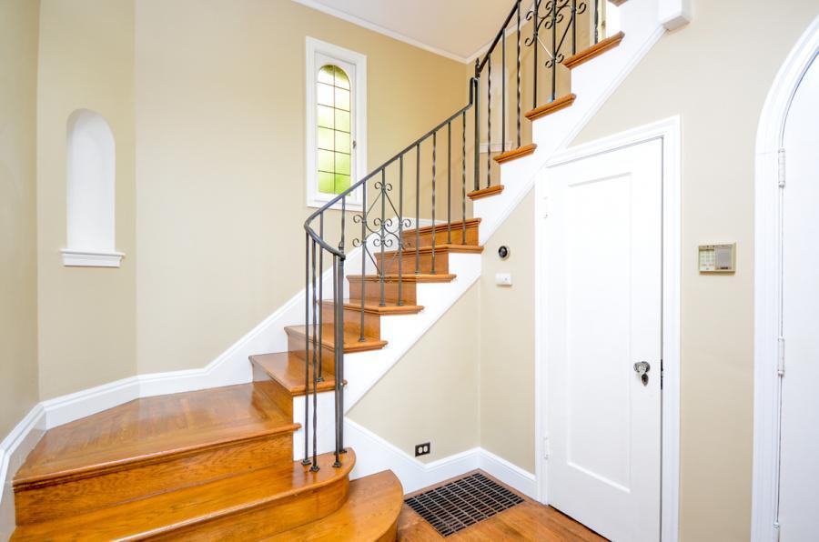 Picture of Home Healing Renovations built this hardwood staircase with iron rails in a client's North Berkeley home. - Home Healing Renovations Inc