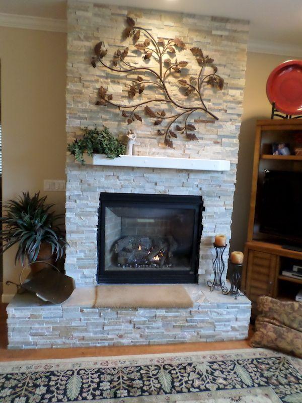 Picture of Thompson Construction recently installed this slate ledgestone fireplace. - Thompson Construction, Inc.