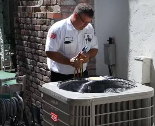 Picture of Owner Gil Medrano Jr. prefers working in the field instead of sitting behind a desk. - All Weather Heating & Air Conditioning Inc.