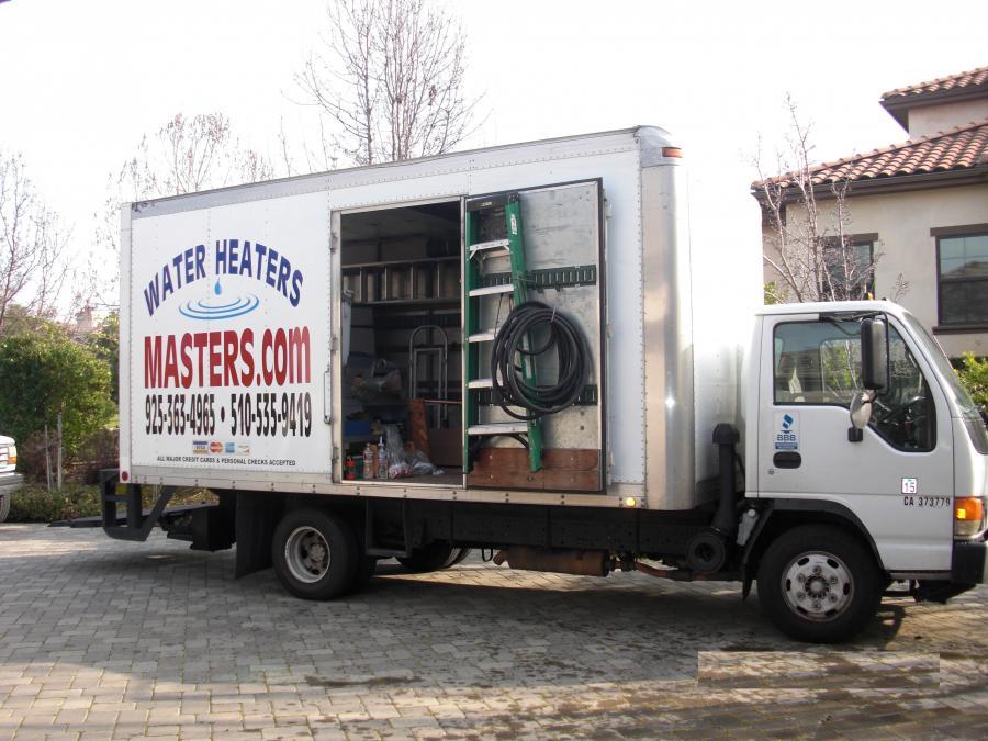 Picture of Water Heaters Masters' trucks are fully equipped to handle a wide variety of water heater replacements and other plumbing jobs. - Water Heaters Masters Inc.