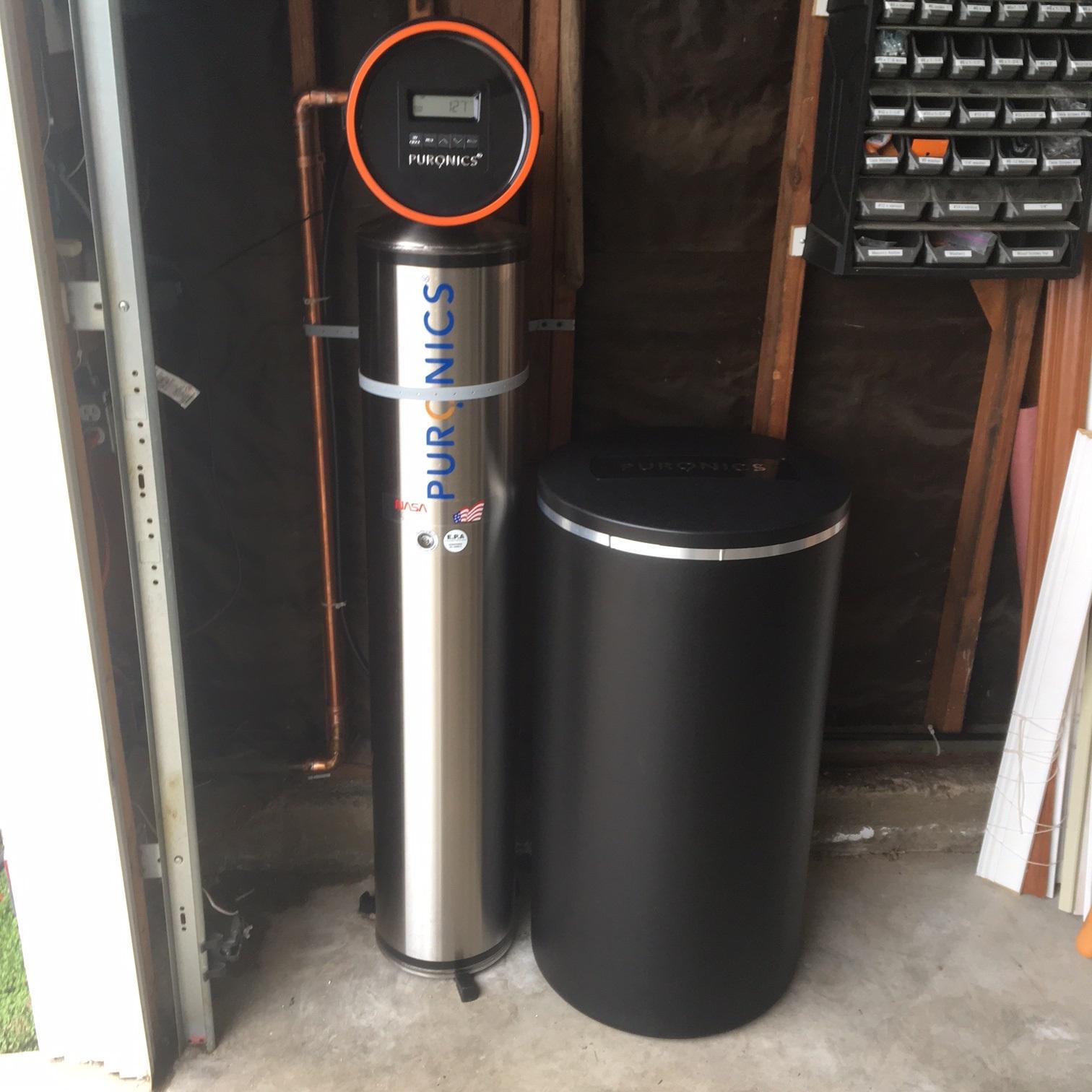 Picture of Puronics installed this Terminator® whole-house water system in a customer's garage. - Puronics, LLC