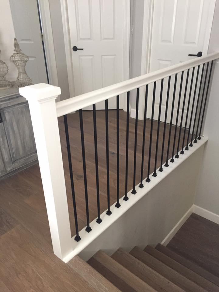 Picture of Martinez Stair Company Inc. used square newel posts with straight metal balusters to create a clean look in this San Ramon townhome. - Martinez Stair Company Inc.