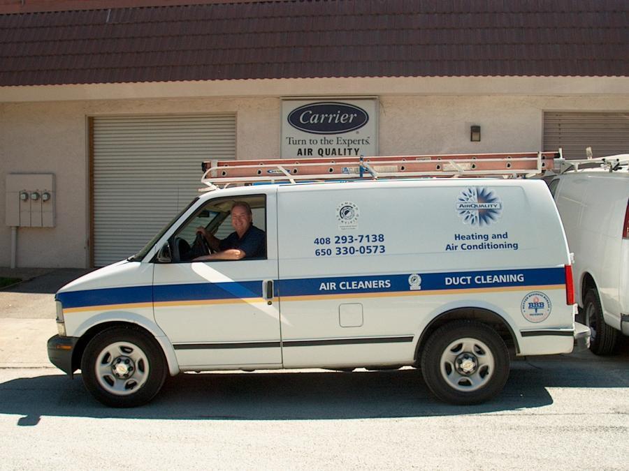 Picture of An Air Quality Heating & Air Conditioning service technician heads out on a job. - Air Quality Heating & Air Conditioning