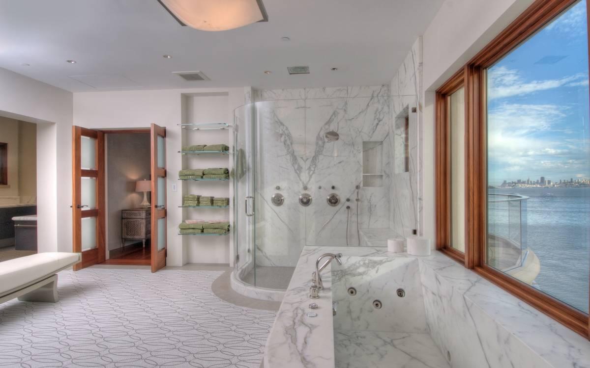 Picture of Schicker Luxury Shower Doors worked on this marble bathroom in a home in Emeryville that overlooks San Francisco. - Schicker Luxury Shower Doors, Inc.