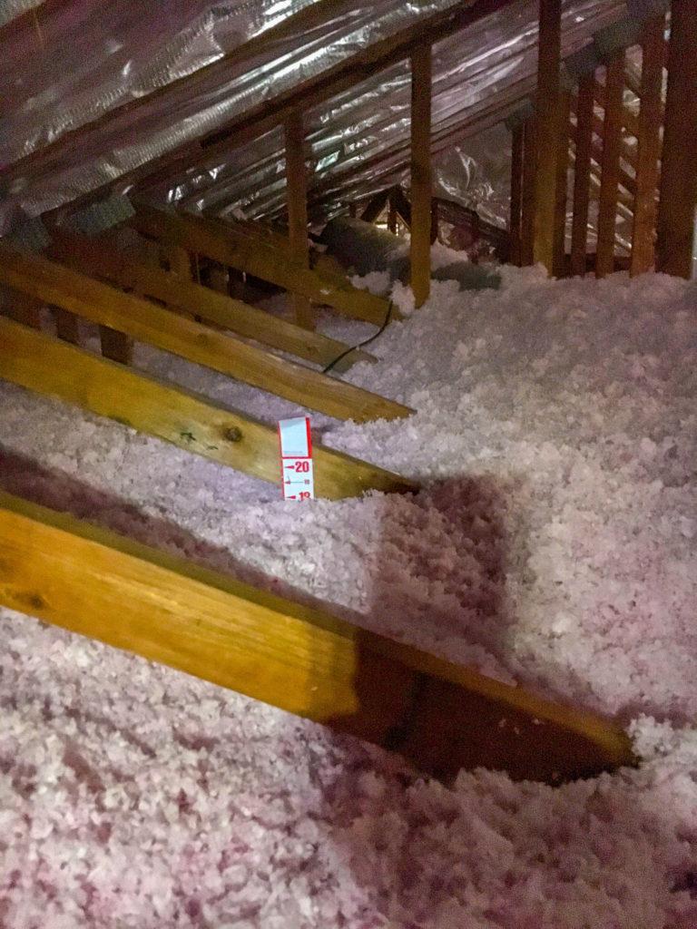 Picture of This attic features newly installed insulation and radiant barrier foil. The attic floor is filled to an R-value of R-49 which provides optimal energy efficiency at 16.75 inches. - Alcal Specialty Contracting, Inc.