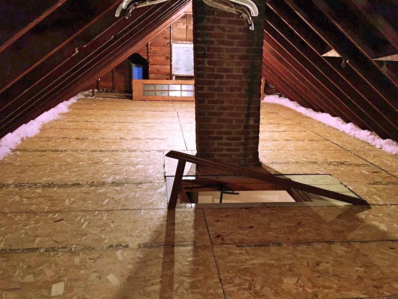 Picture of Atticare created a storage area in this attic. - Atticare Construction