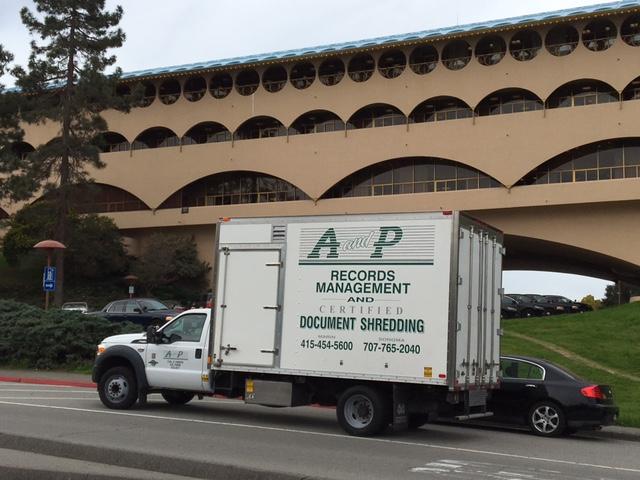 Picture of A and P Moving's shredding truck heads to a jobsite. - A and P Moving, Inc.