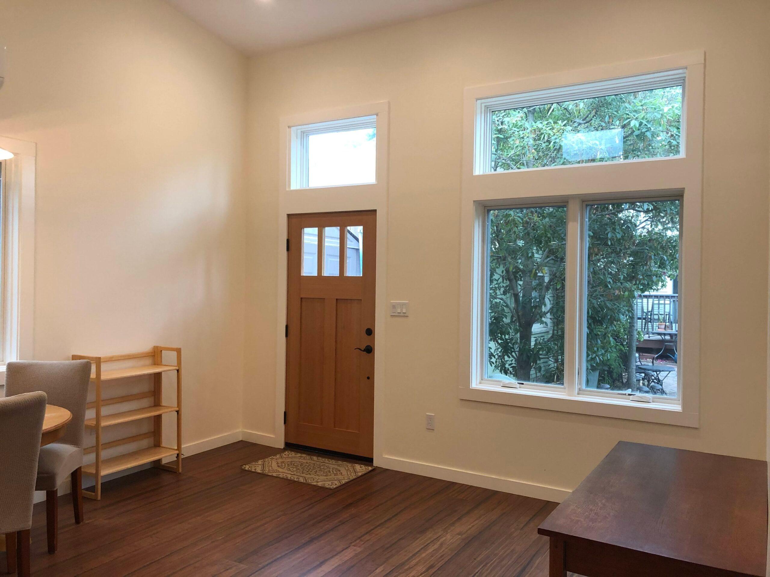 Picture of Green Living Builders transformed this living space by installing windows to bring in more light. - Green Living Builders LLC
