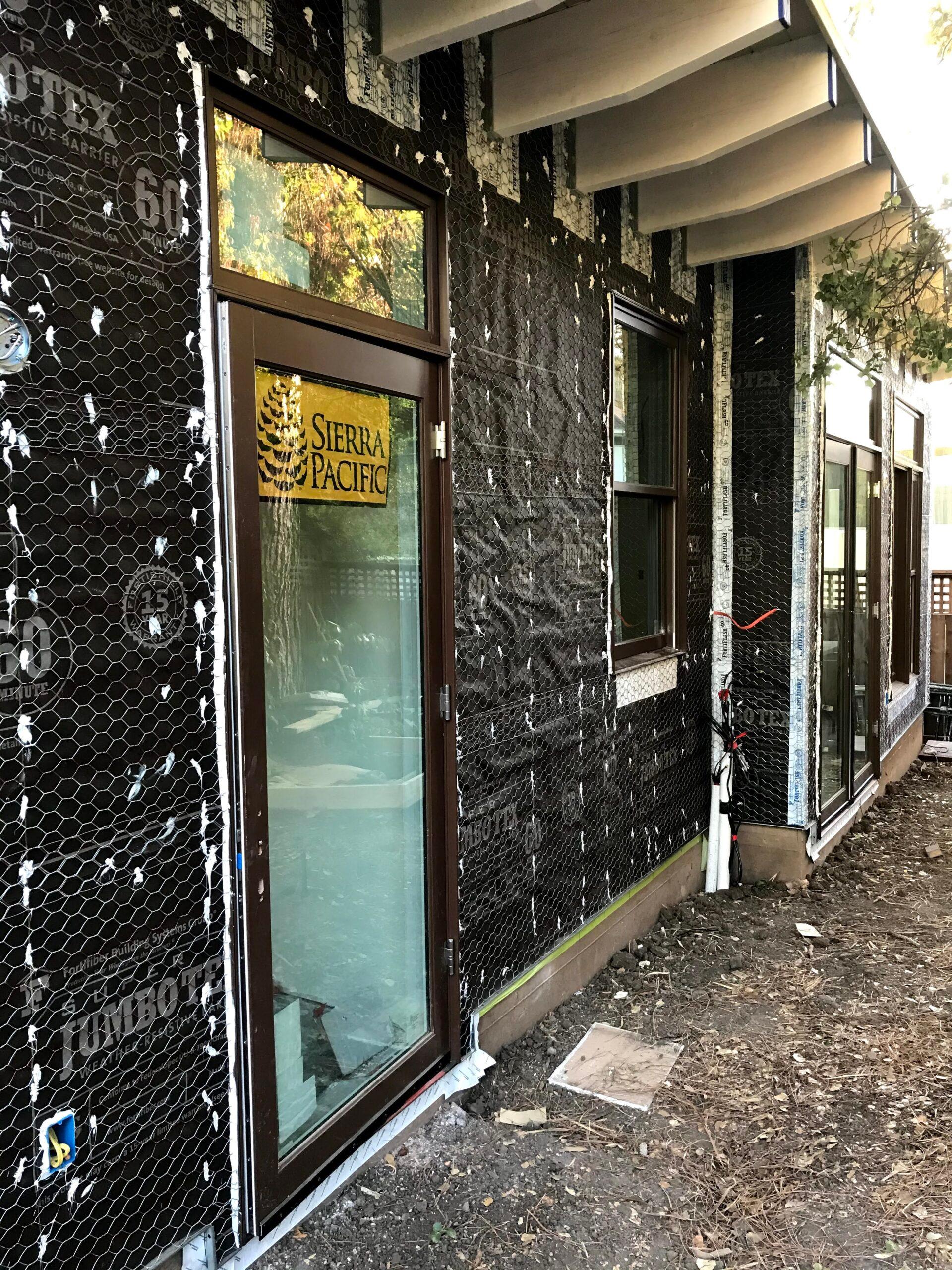 Picture of A look at the exterior preparation stage for a stucco wall project by Green Living Builders - Green Living Builders LLC