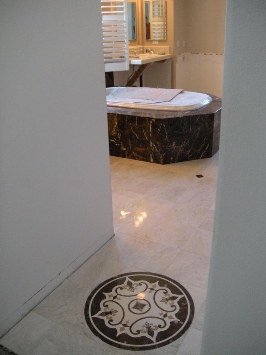 Picture of DC Tile and Stone installed this porcelain tile floor and marble tile tub surround. - DC Tile and Stone