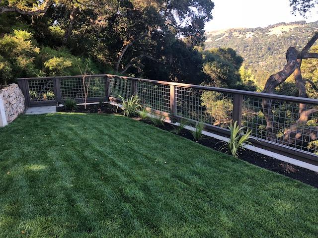 Picture of This hog wire fence makes it possible for the homeowners to still enjoy the view. - A & J Fencing