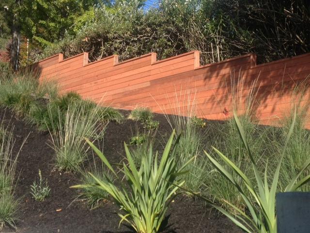 Picture of A & J Fencing installed this horizontal stepped fence. - A and J Fencing