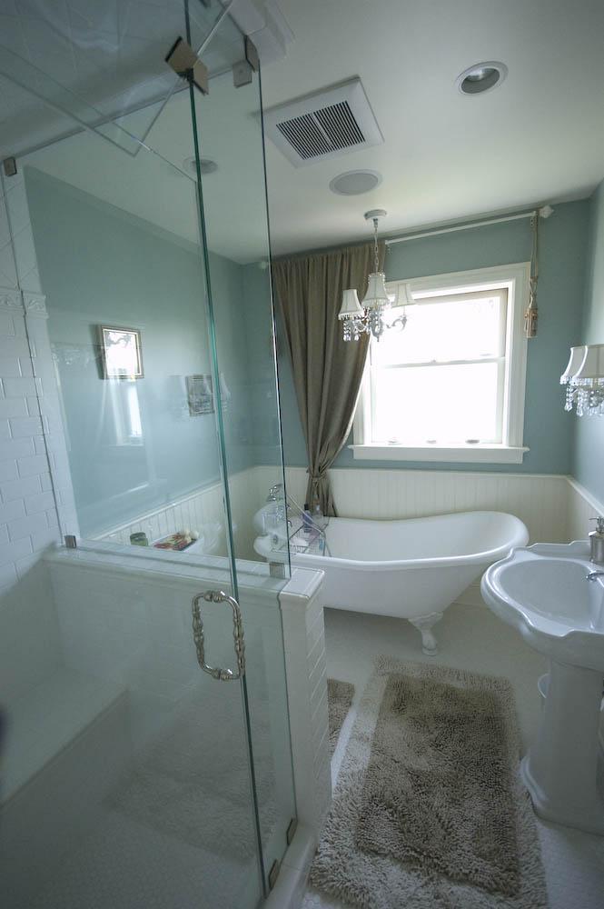 Picture of Christopher Wells Construction worked on this bathroom in a 1920s Tudor home and added a claw-leg curved tub. - Christopher Wells Construction, Inc.
