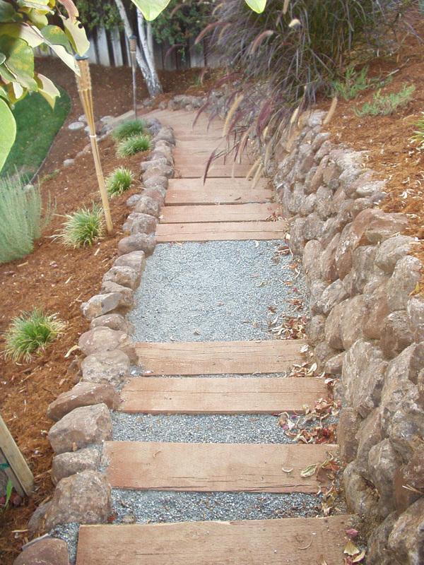 Picture of This path leads to the upper area of a sloped yard in Clayton. - Natural Landscaping Contractors