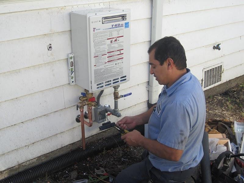 Picture of Takagi Tk-3 OS tankless water heater installation - Albert Nahman Plumbing, Heating and Cooling