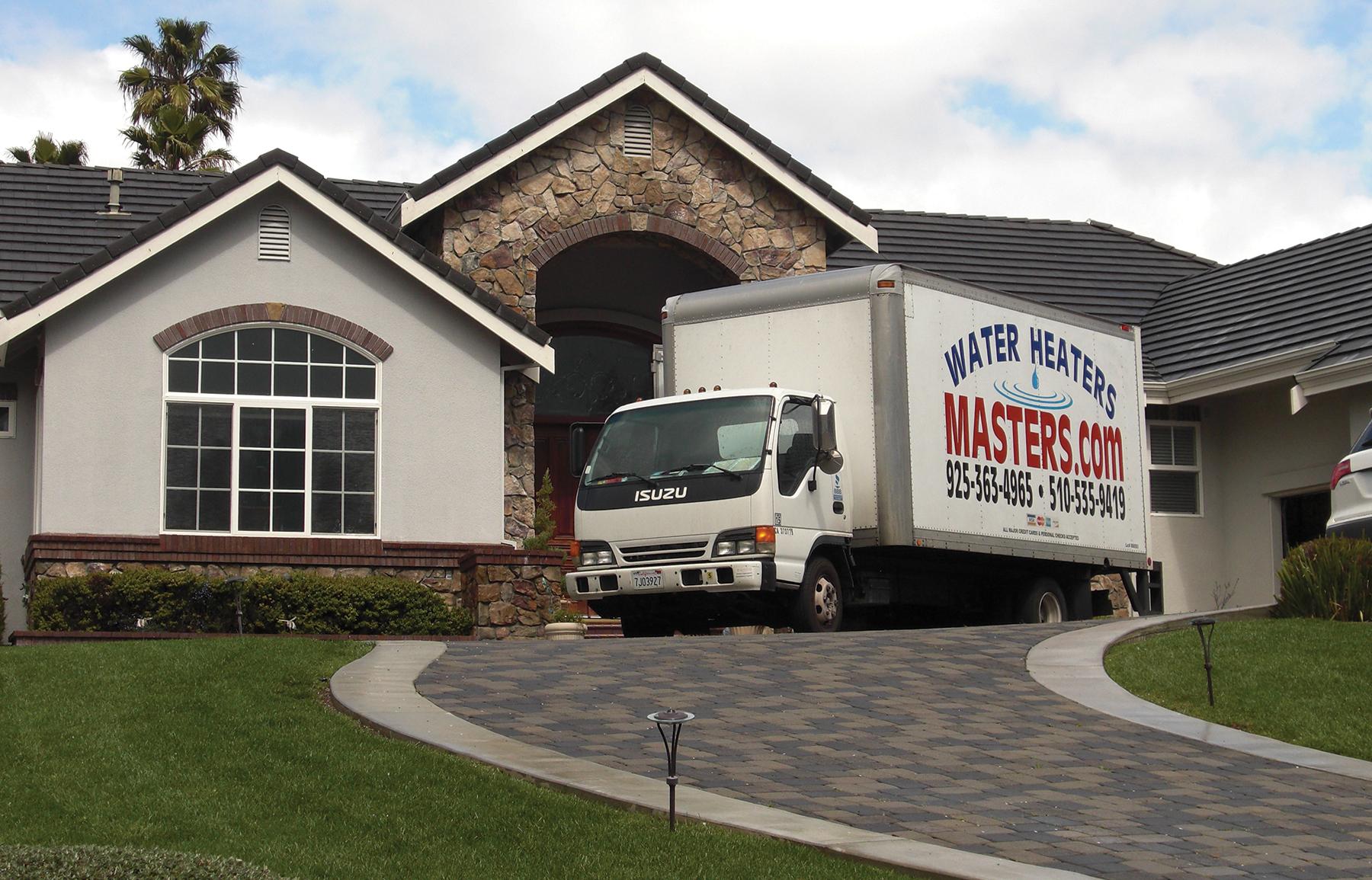 Picture of Water Heaters Masters sends a fully stocked service truck to every job. - Water Heaters Masters Inc.