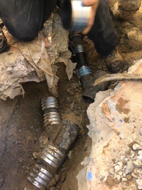 Picture of Absolute Plumbing and Drain performed this sewer repair underneath a slab in an apartment unit. - Absolute Plumbing and Drain