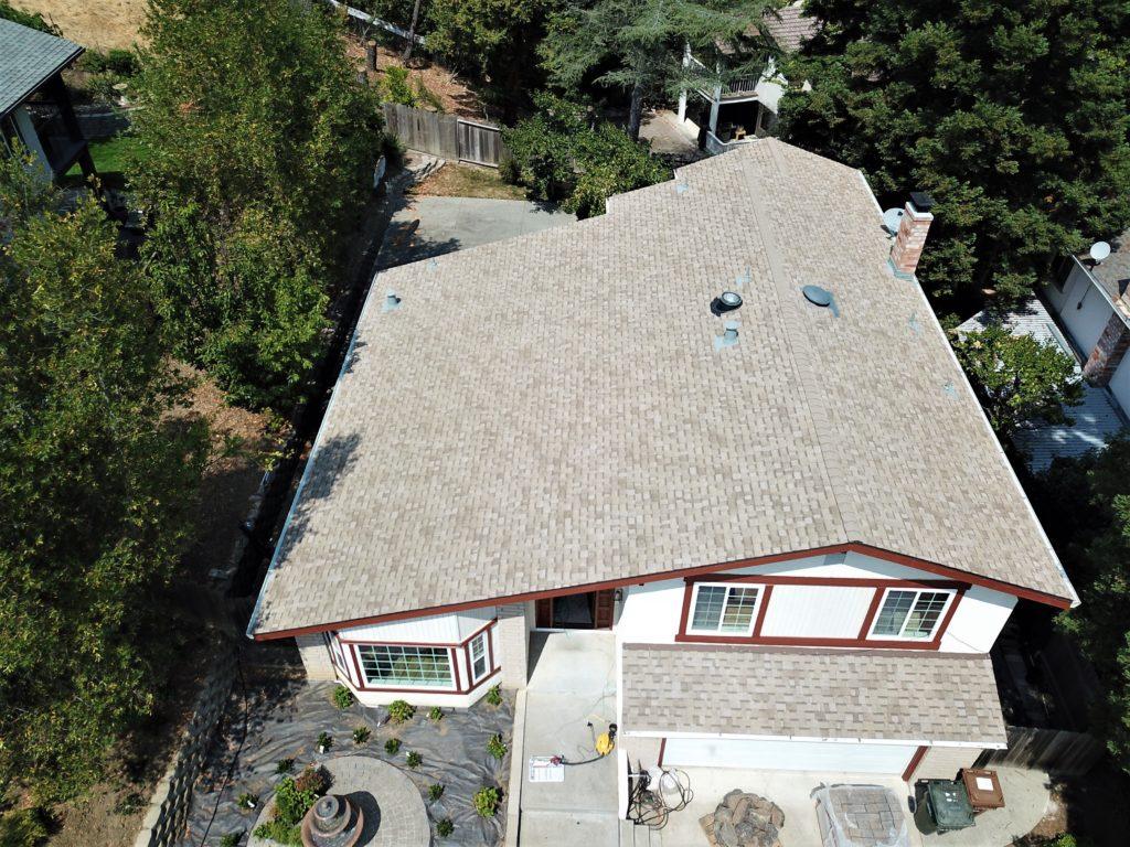 Picture of PRI-Premiere Roofing installed this salt box pitched roof. - PRI-Premiere Roofing Inc.