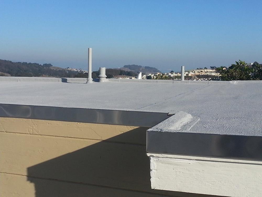Picture of An "after" shot of a recent flat roof project by Sure Roofing & Waterproofing - Sure Roofing & Waterproofing