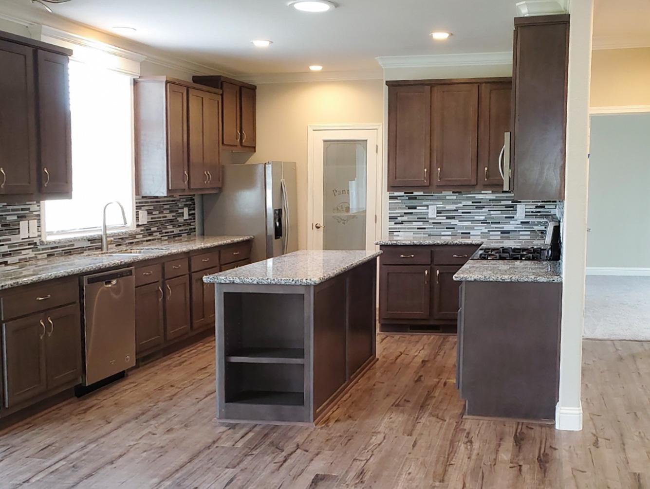 Picture of This kitchen remodeling project in Santa Rosa features new flooring and recessed lighting. - J A Serrano Construction