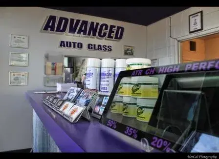 Picture of Advanced Auto Glass carries its own glass cleaner because of its special formula that's safe to use on tinted windows. - Advanced Auto Glass & Detail