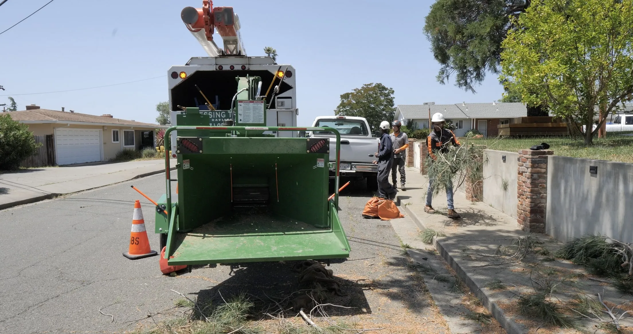 Picture of A Blessing Tree Service expertly manages the cleanup of fallen branches, showcasing their dedication to quality outcomes. Their team, focused on precision and safety, reflects the companyâ€™s high customer satisfaction ratings. Copyright ©2025 Diamond Certified Resource - A Blessing Tree Service