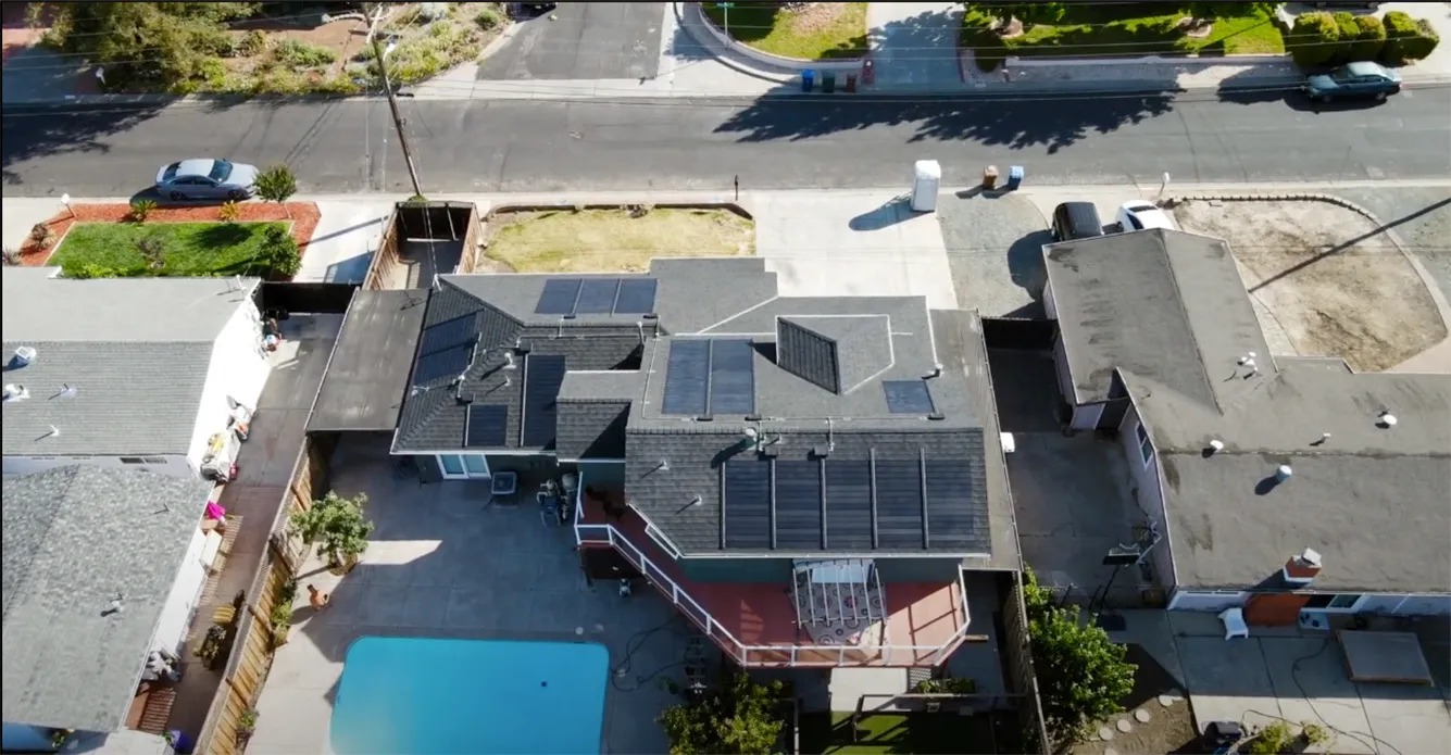 Picture of An overhead view captures solar panels expertly installed by Bay Valley Roofing on a residential roof, reflecting their focus on quality outcomes. Bay Valley Roofing is recognized for expertise and quality. Copyright ©2025 Diamond Certified Resource

 - Bay Valley Roofing