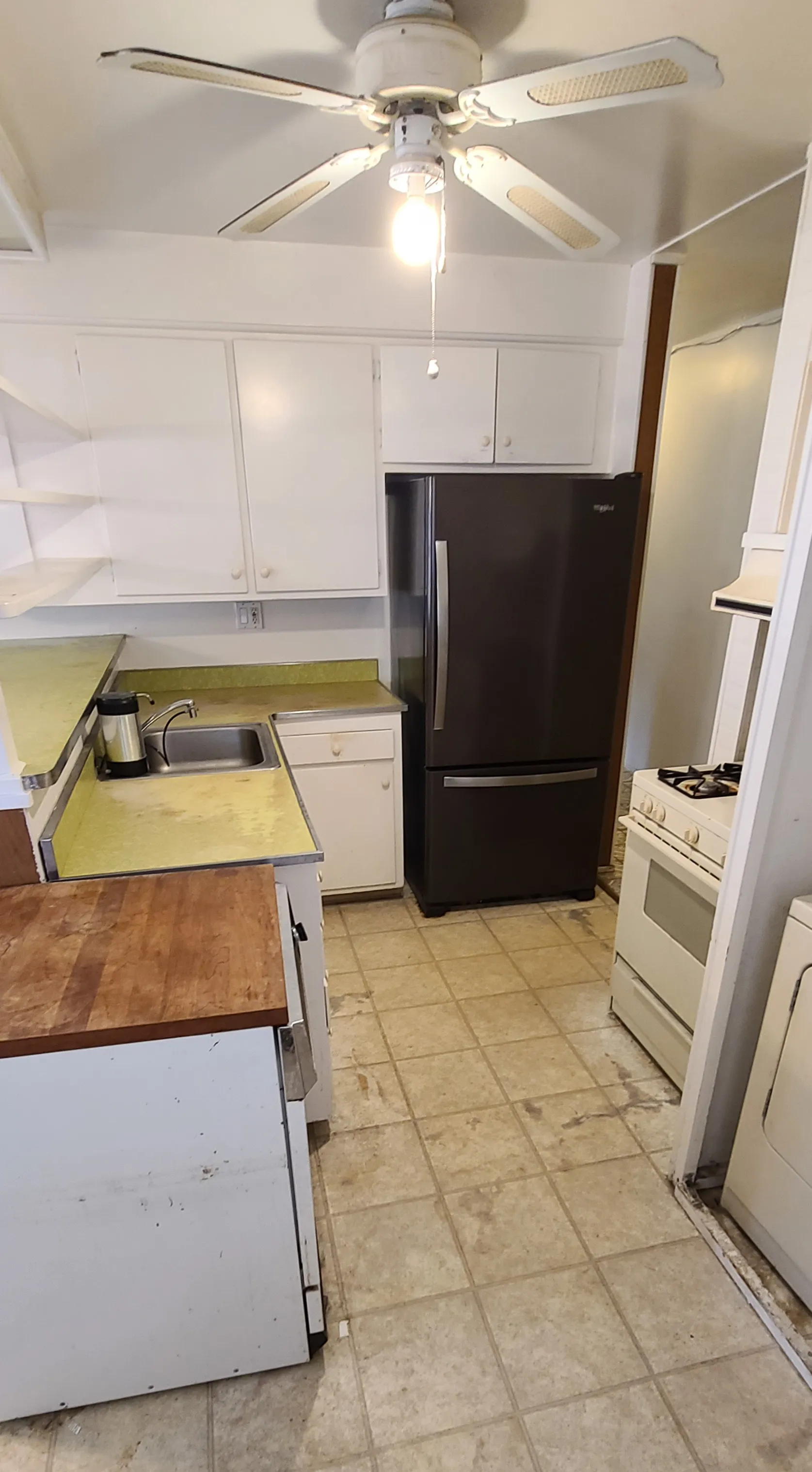 Picture of In this modest kitchen, signs of aging tell stories of use and time. Dahme Construction steps in, leveraging its renowned craftsmanship and high customer satisfaction to transform such spaces. Copyright ©2025 Diamond Certified Resource - Dahme Construction