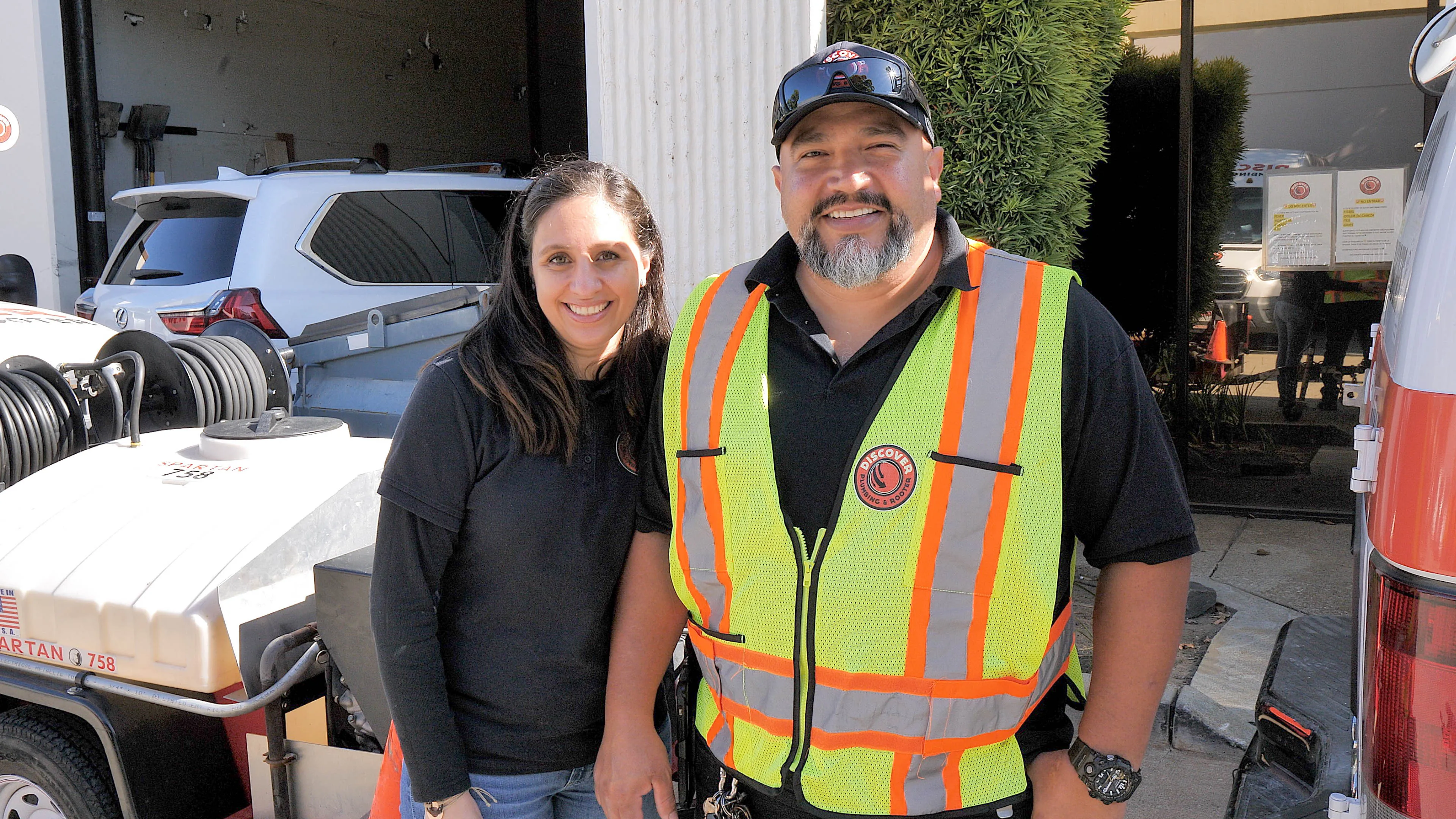 Picture of Discover Plumbing & Rooter employees smile confidently beside their equipment, showcasing the company's dedication to quality outcomes. Recognized for expertise, they exemplify top-rated service. Copyright ©2025 Diamond Certified Resource - Discover Plumbing & Rooter