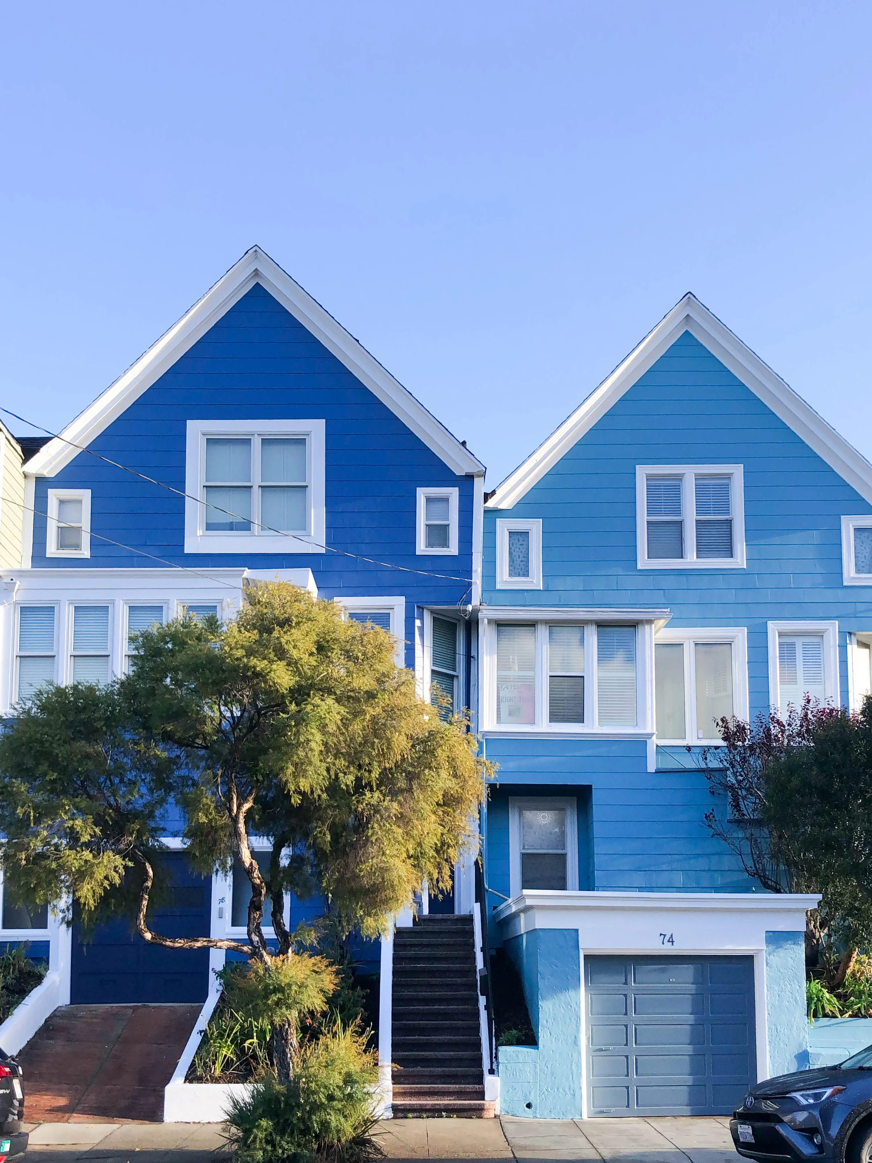 Picture of Two adjacent houses shine brightly in distinct blue hues, showcasing the expert craftsmanship of Michael Sack Painting, Inc. The companyâ€™s focus on quality outcomes ensures a standout finish. Copyright ©2025 Diamond Certified Resource

 - Michael Sack Painting, Inc.
