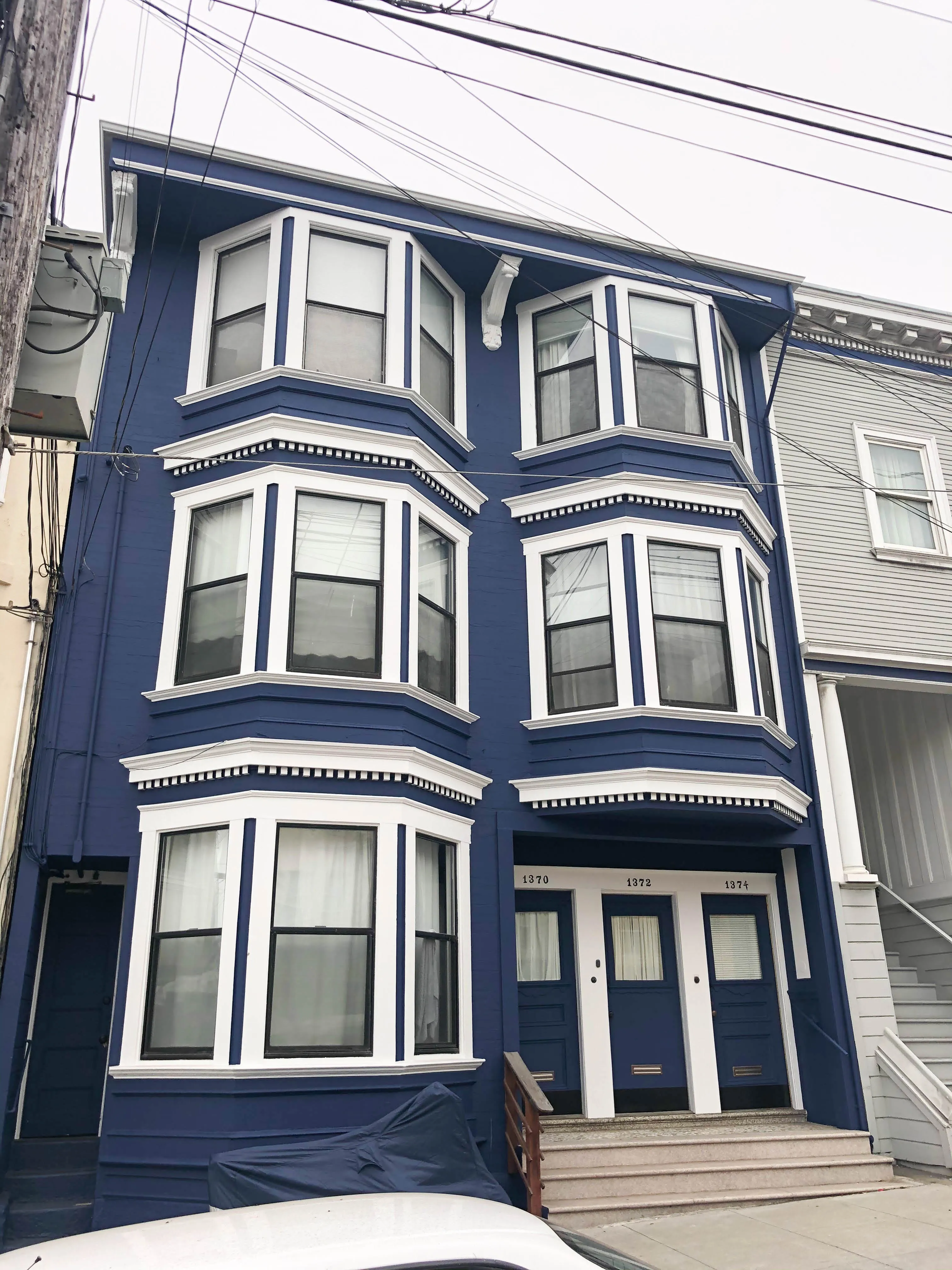 Picture of The bold blue facade of this classic building reflects the artistry of Michael Sack Painting, Inc., a company recognized for expertise and quality. Each brushstroke tells a story of dedication to high standards. Copyright ©2025 Diamond Certified Resource - Michael Sack Painting, Inc.