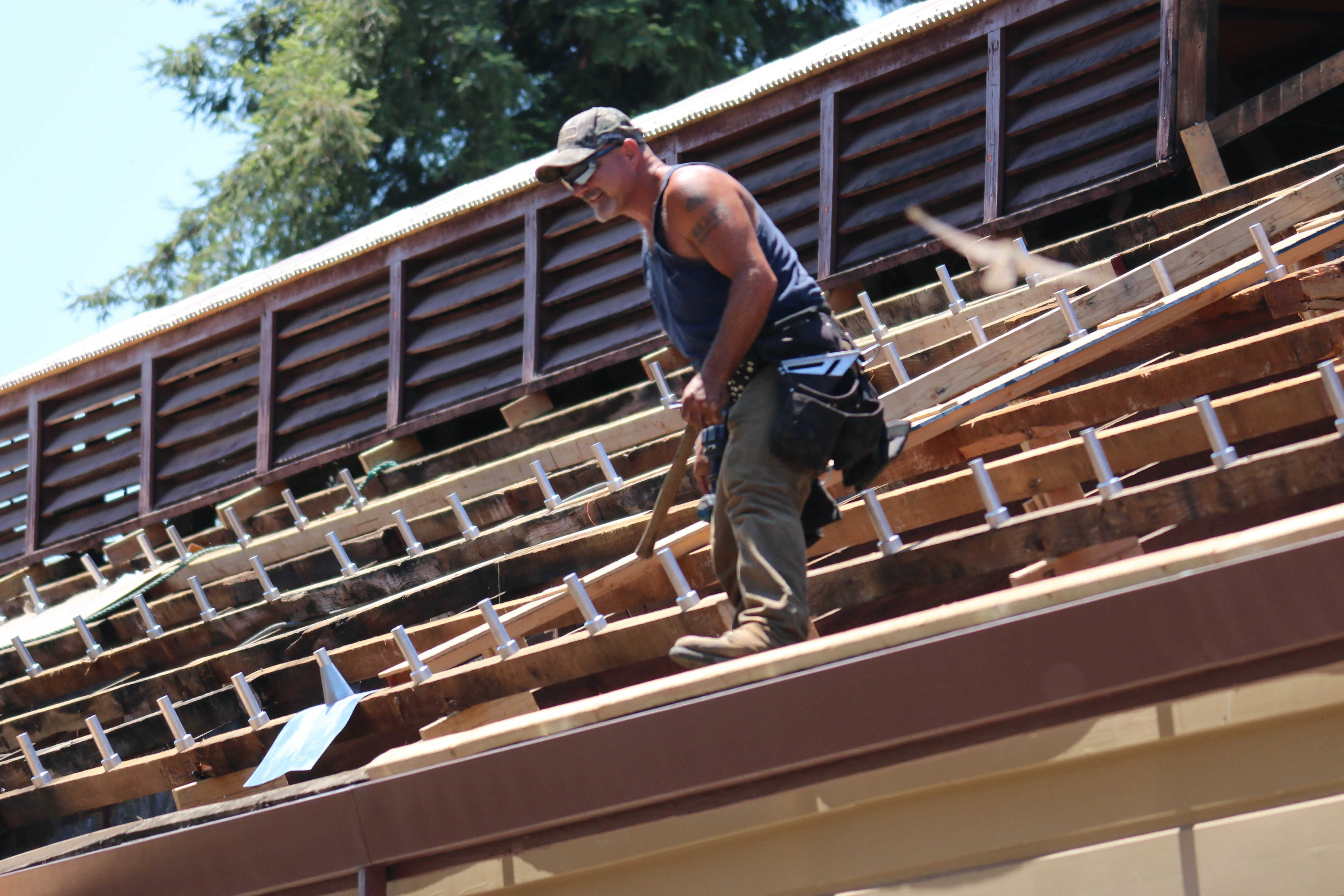Picture of A seasoned roofer skillfully maneuvers across timber rafters, a testament to Sterling Roofing Co., Inc.'s dedication to quality outcomes. The companyâ€™s focus on excellence ensures every roof stands the test of time. Copyright ©2025 Diamond Certified Resource

 - Sterling Roofing Co., Inc.